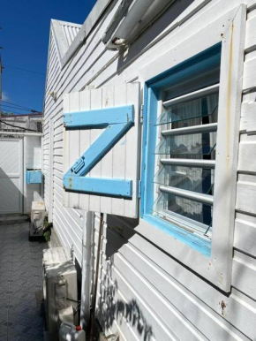 Maison de 2 chambres avec jacuzzi jardin clos et wifi a Sainte Anne